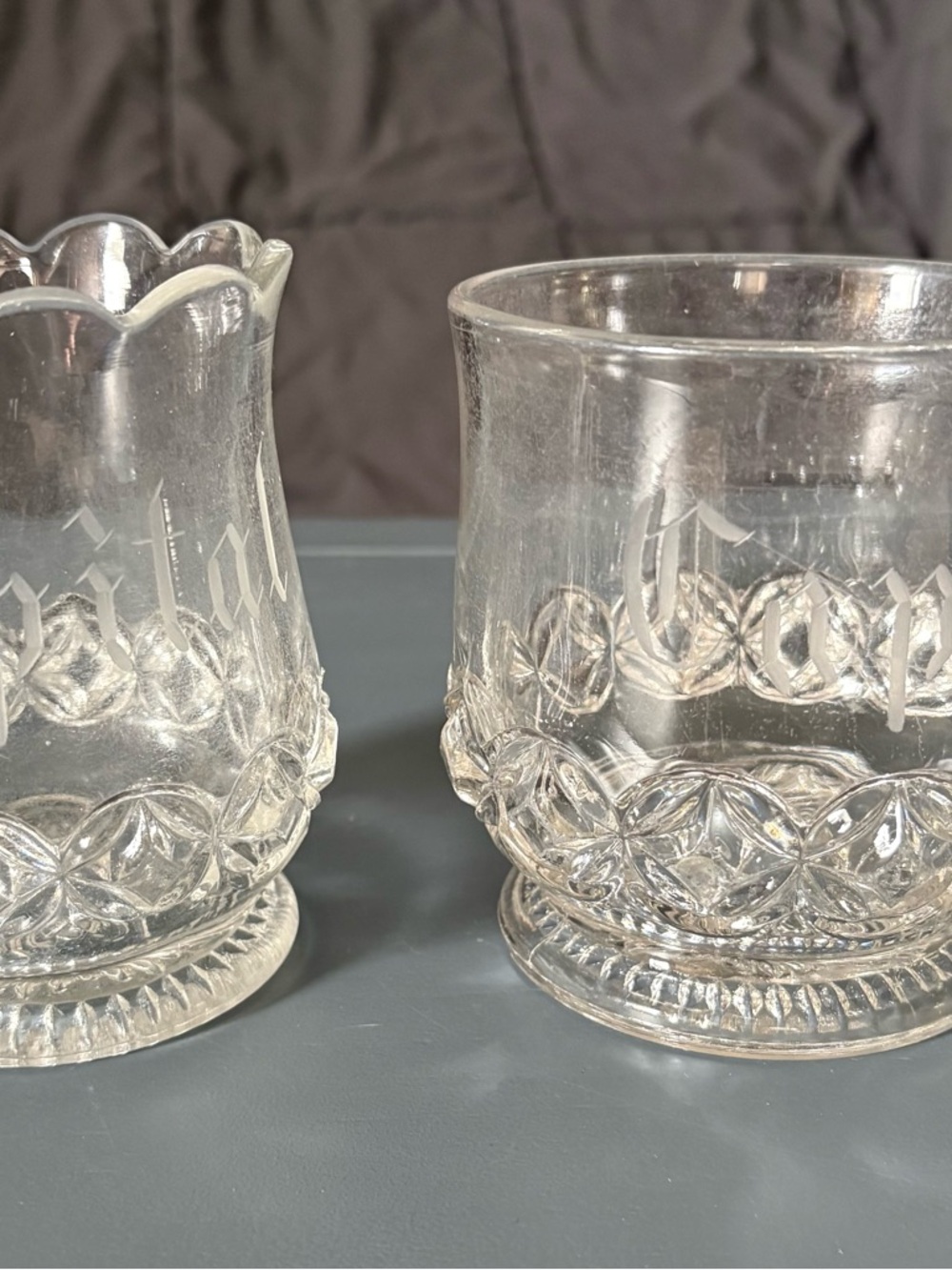 Early American Pressed Glass (EAPG) pieces, likely a spooner and a celery vase